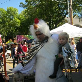 IMG_5495_Willy_St_chicken_man_and_son.JPG